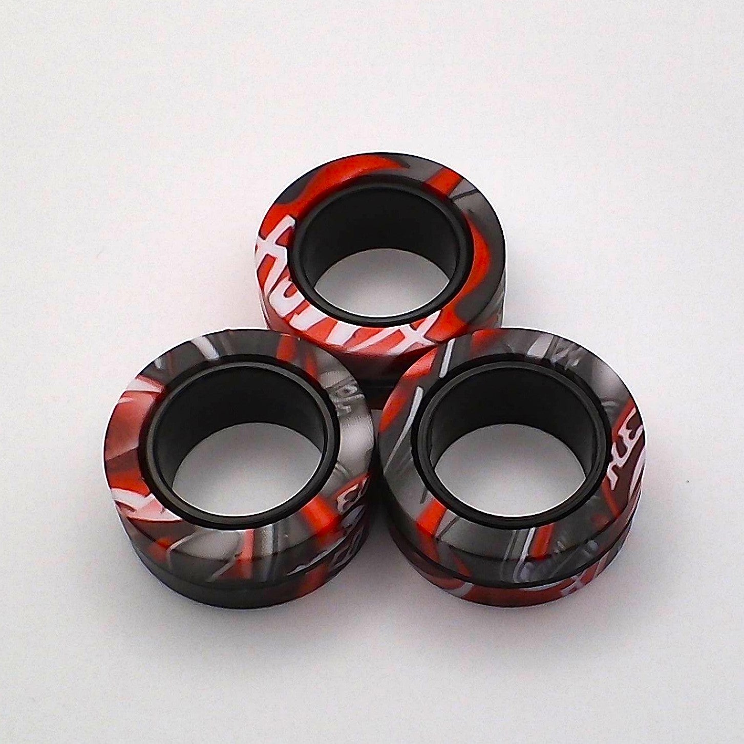Black and red magnetic ring spinner fidget toy