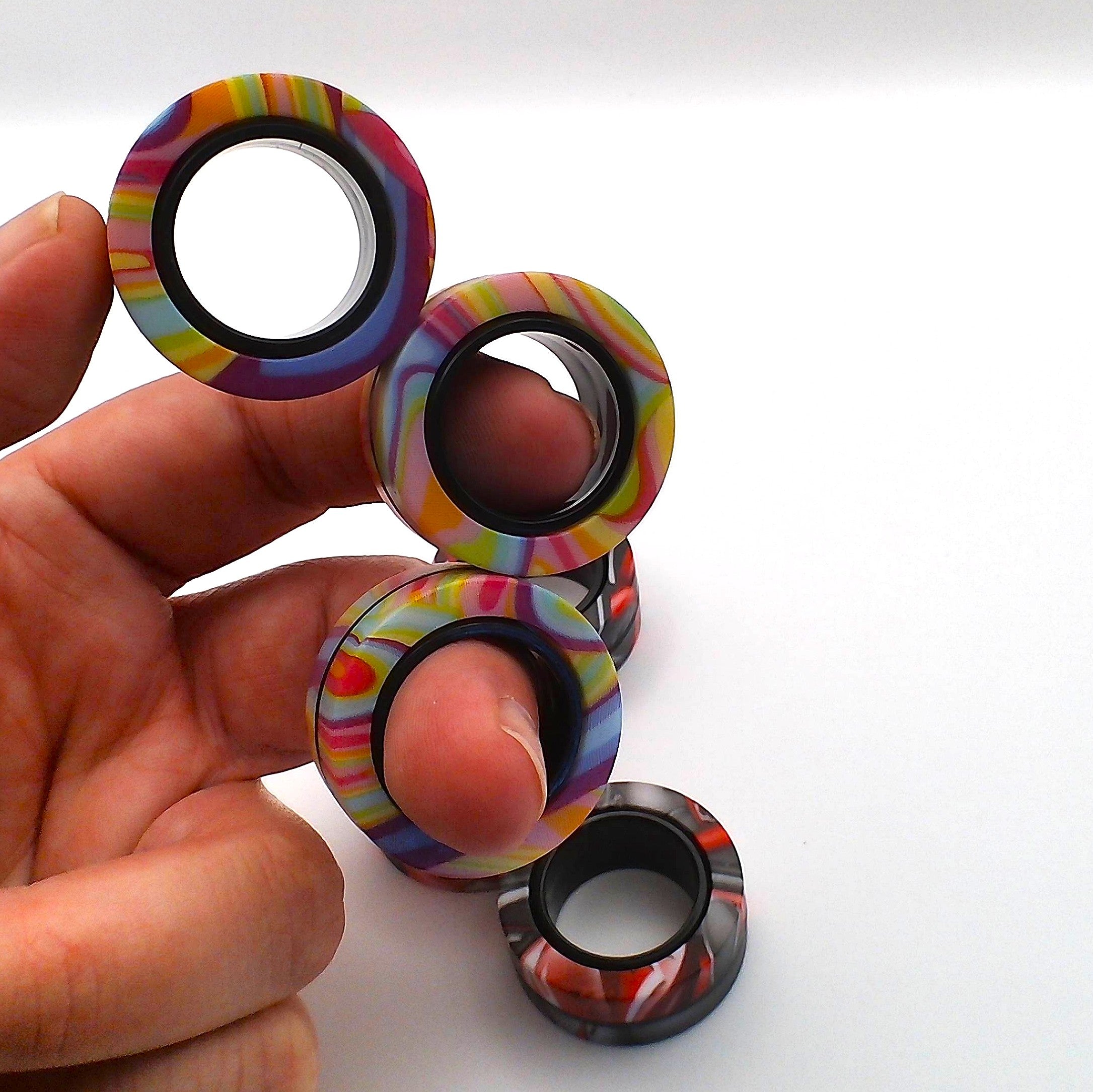 Set of three magnetic ring spinner fidget toys